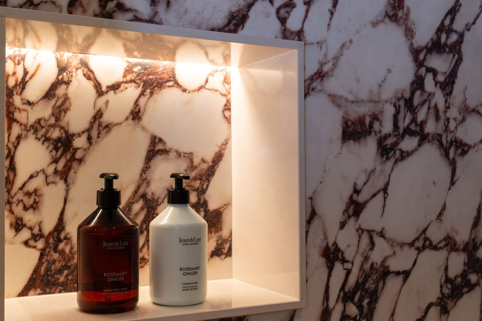 Marble bathroom niche with toiletries at Casa Roca boutique hotel in Palma