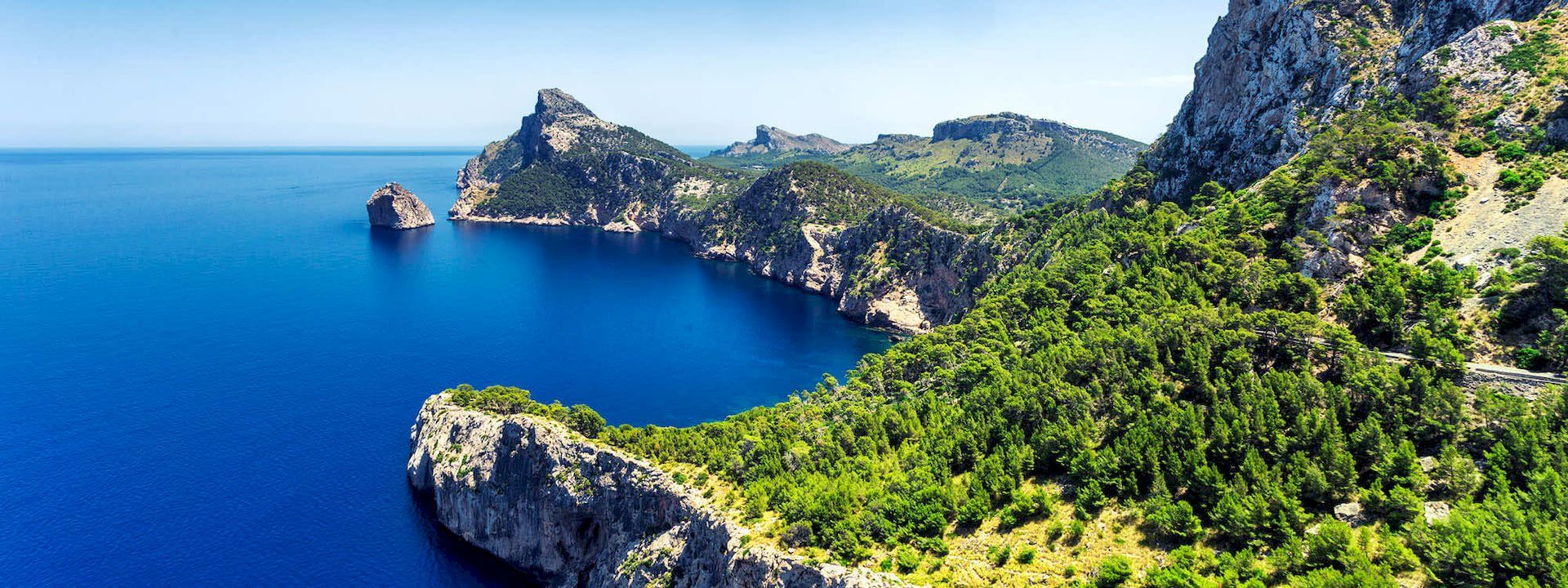 Panoramic view of the Cap de Formentor headland and deep blue sea on a day trip from Palma