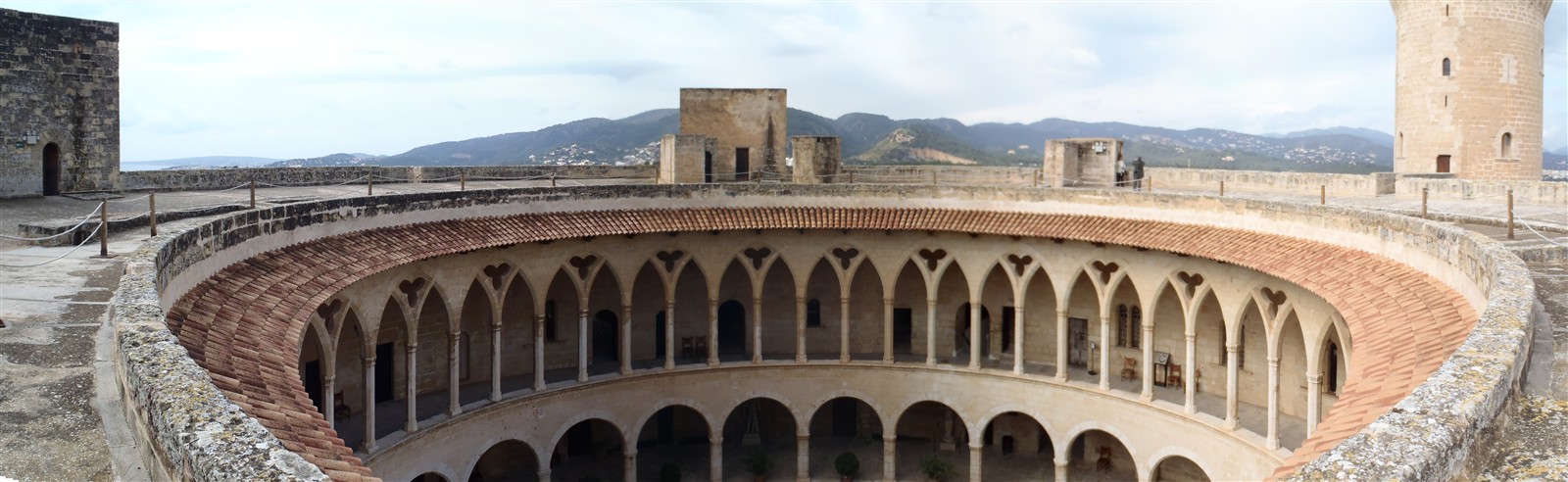 Panoramic view of the circular walls and keep of Bellver Castle above Palma