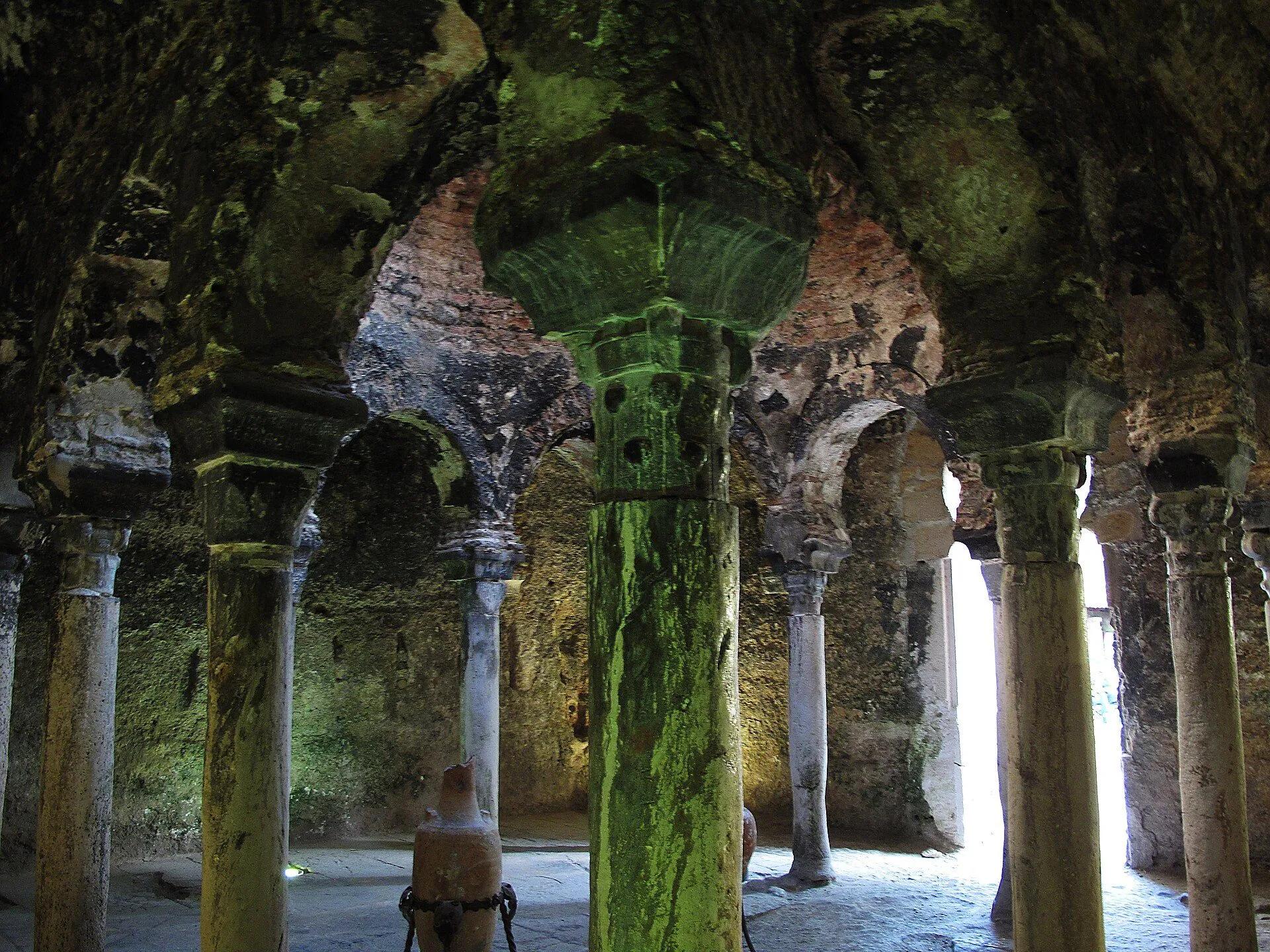 Columns and horseshoe arches inside the caldarium of the Arab Baths in Palma Old Town