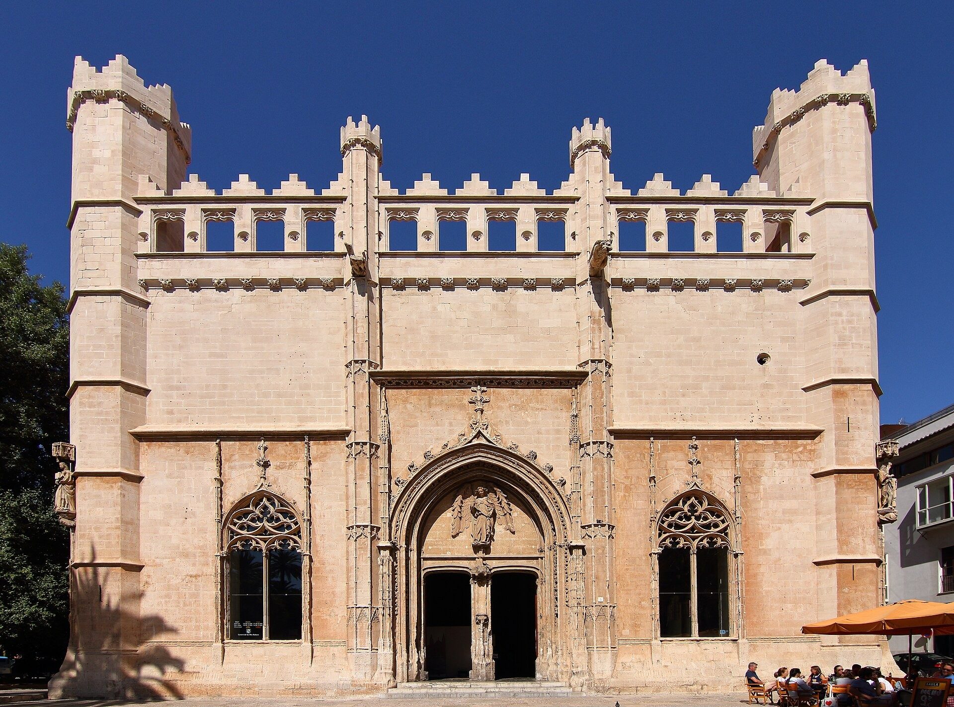 Gothic facade of La Llotja in Palma with cafe terraces in the wine bar quarter